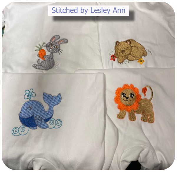 Awesome Animals bottom of grandsons sleepsuit by Lesley Ann