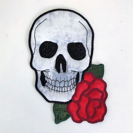 In the hoop Skull with Roses Coaster