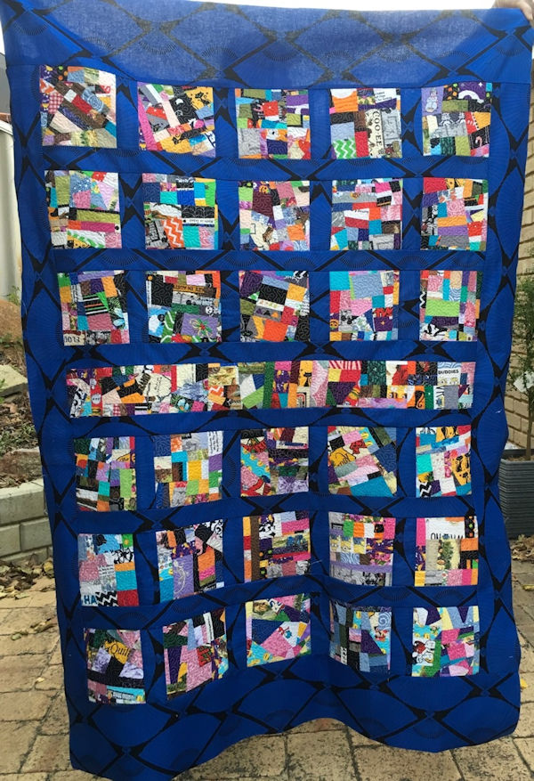 Quilt made using Crazy Patch Fabric by Faye
